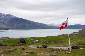 The Greenlandic flag flies in the territory President Trump plans to annex